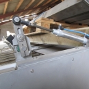 3381 Upmann weigher and tray packing line