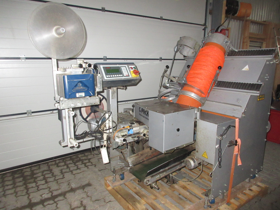 5516 C-Pack VAC 929 Net clipper automatic net bagger