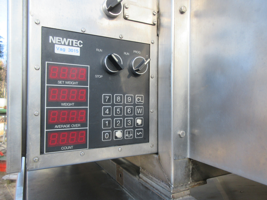 5752 Newtec 2000/G40 weigher and bagger